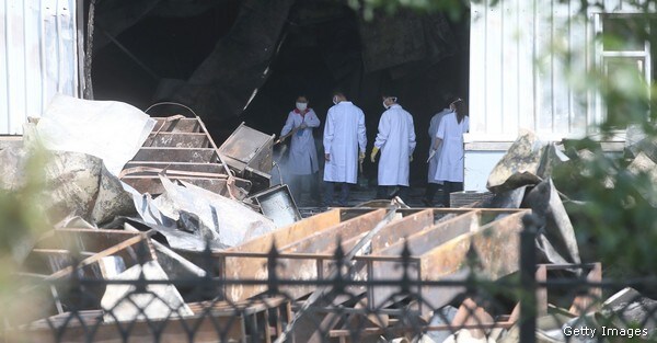 Relatives Demand Answers After Chinese Fire Kills 120