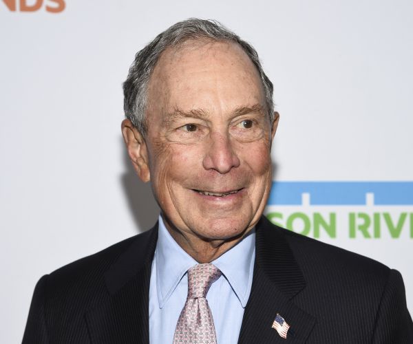 michael bloomberg smiles during a red carpet visit