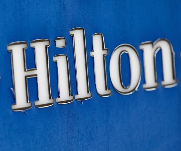 Hilton Profit Beats on Room Tariffs, Travel Demand