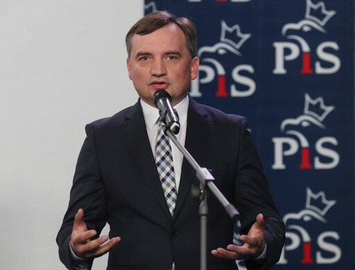 Poland's Justice Minister Seen Carrying Pistol in His Belt