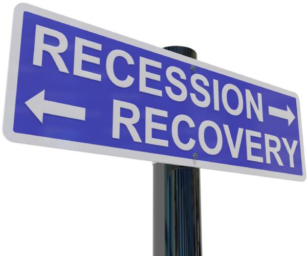 a roadsign pointing to recession and recovery