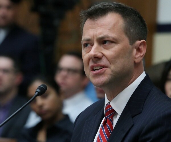 strzok in a navy blue suit and red and blue striped tie