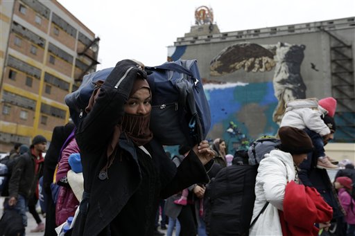 The Latest: EU: Nations Not Helping Refugees in Italy Enough