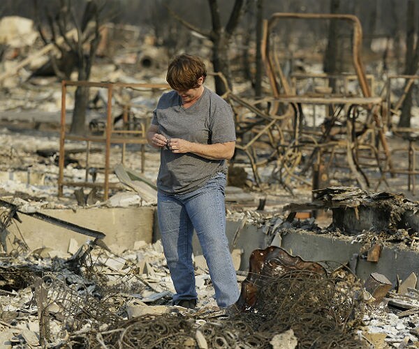 Romney Blames Govt for Failure to Stop Spread of Wildfires