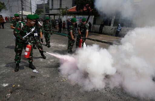 The Latest: Social Media Blocked Due to Indonesia Protests