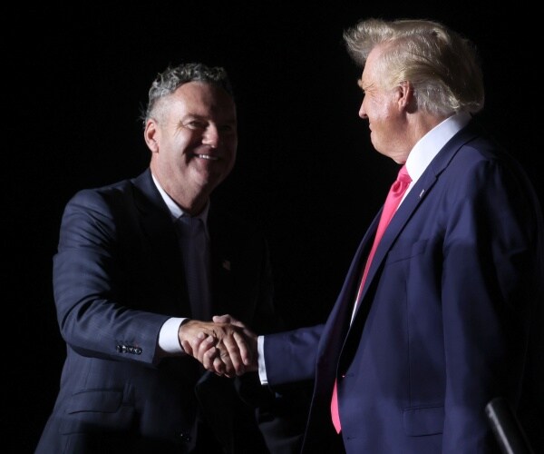 donald trump greets tim michels