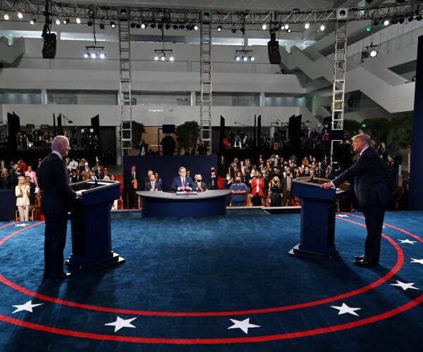 donald trump and joe biden stand on debate stage