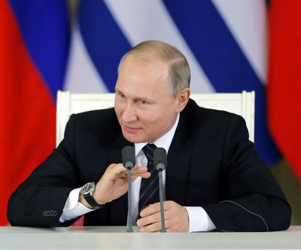 Kremlin Defends Its Recognition of Ukraine Rebel Passports