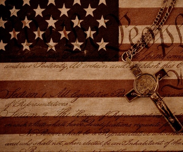 an american is overwritten by the bill of rights and has a crucifix on it