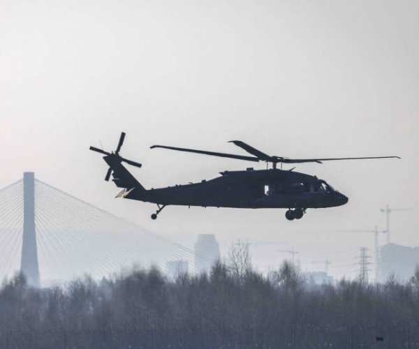 a helicopter takes flight