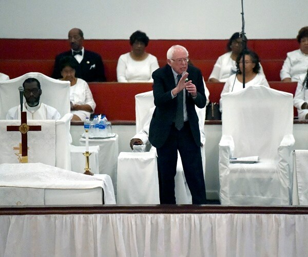 bernie sanders speaks at a church from stage 