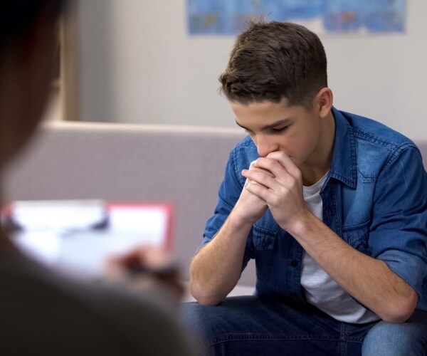 Boy in therapy session