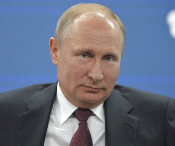 Putin: We're Held Hostage to Political Strife Around Trump