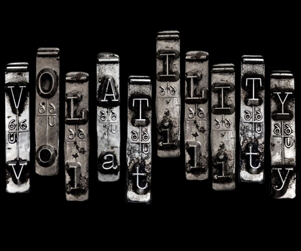 volatility in typewriter font, in capital and lower case letters