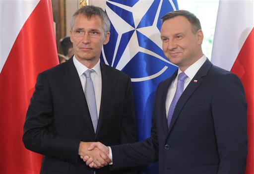 The Latest: Greek Protesters Deplore New NATO Deployments