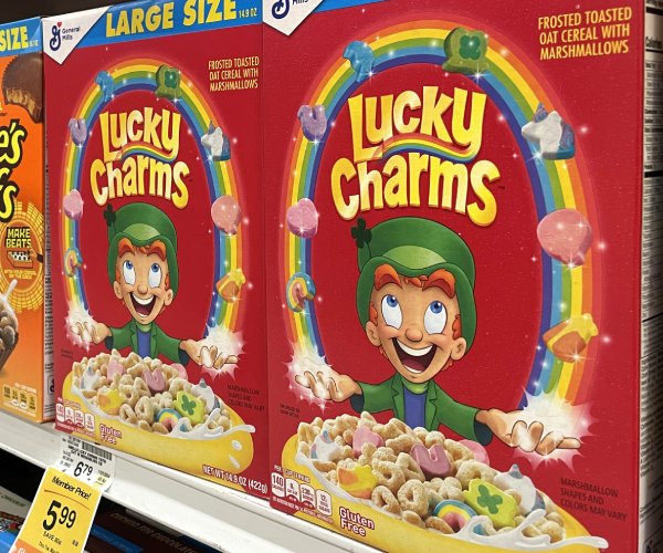 boxes of lucky charms on a store shelf
