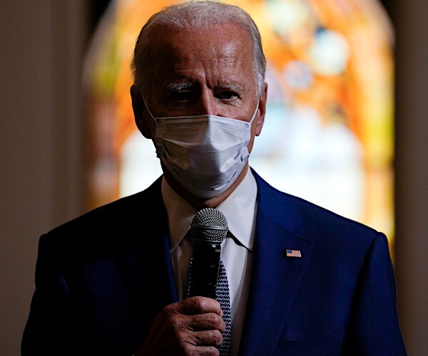 Joe Biden speaks as he meets with members of the community at Grace Lutheran Church in Kenosha