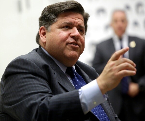 JB Pritzker speaking at a campaign event