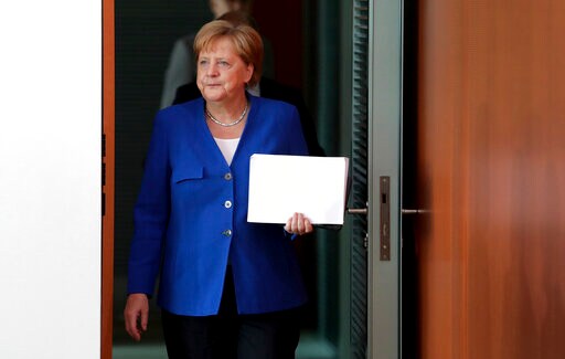 The Latest: Merkel Says Irish Border Is Key Brexit Issue