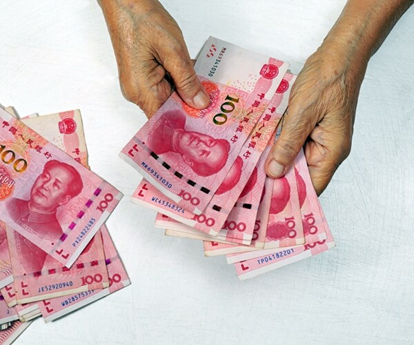 China's Yuan Weakens After Signs of Stability Calm Markets
