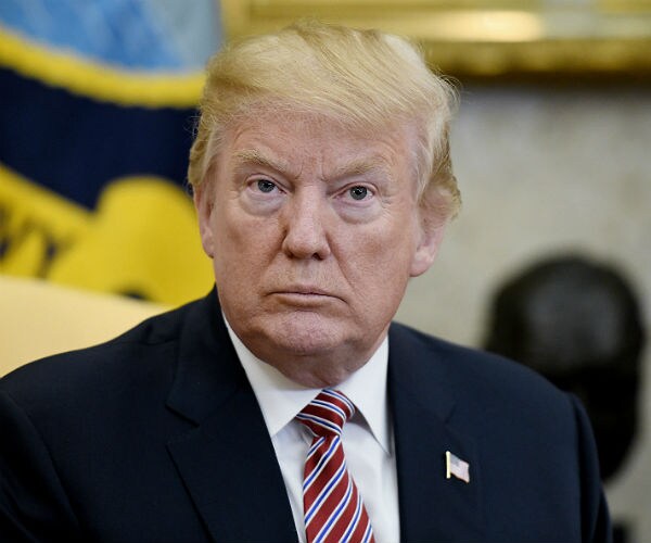 AP-NORC Poll: Nearly 6 in 10 Americans Say Trump a Racist