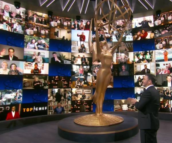 kimmel standing in front of giant tv screen