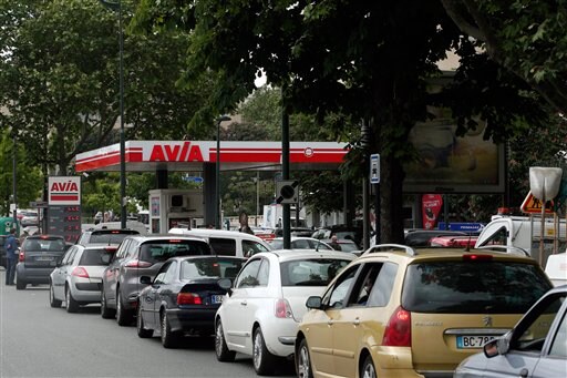 The Latest: Protests Idle Some French Oil Refineries