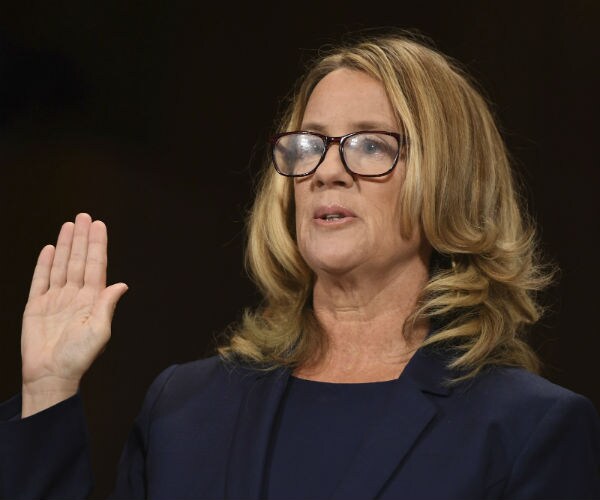 christine blasey ford is sworn in before testifying