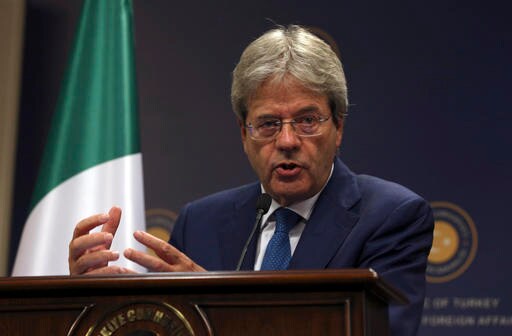 The Latest: Italy's Foreign Minister Asked to be New Premier