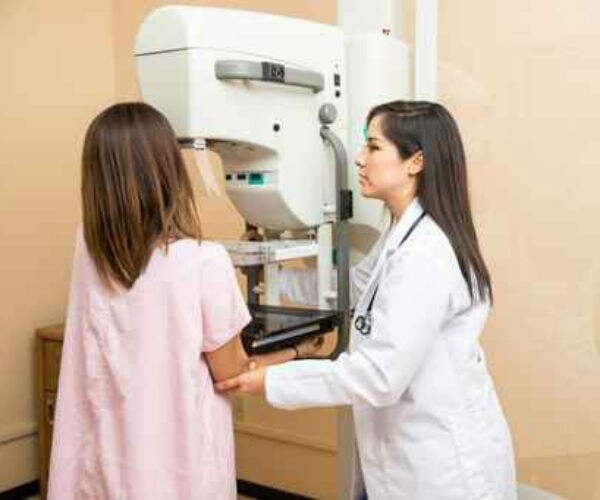 woman getting ready for mammogram