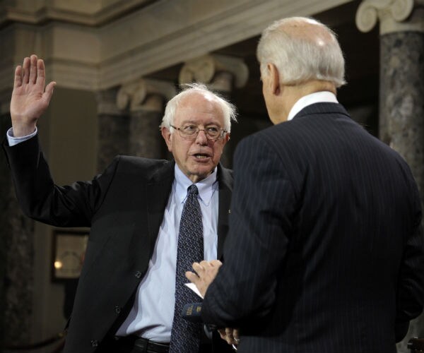 sen. bernie sanders with former vice president joe biden