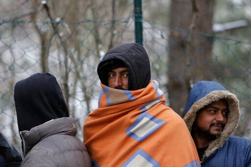 The Latest: Italy Bows out of Meeting on UN Migration Pact