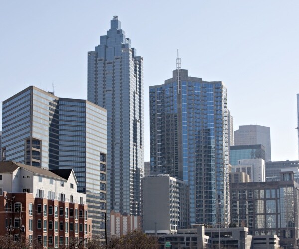 Atlanta Police Arrest Man Carrying Concealed Rifles, Pistols