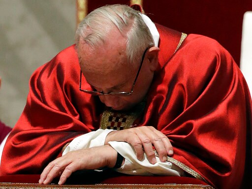 The Latest: Pope Presides over Way of the Cross Procession