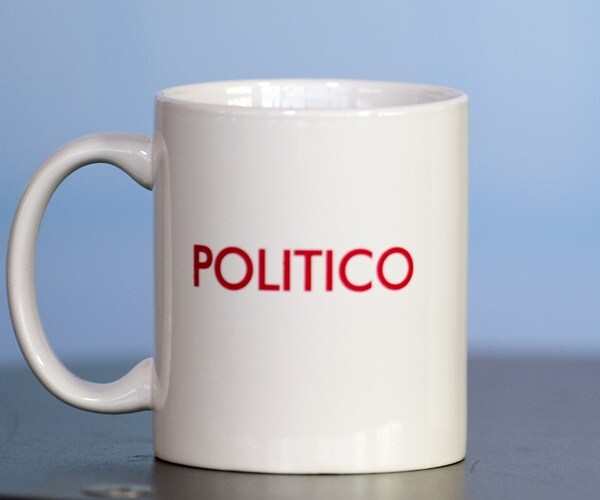 a politico mug sits on a table