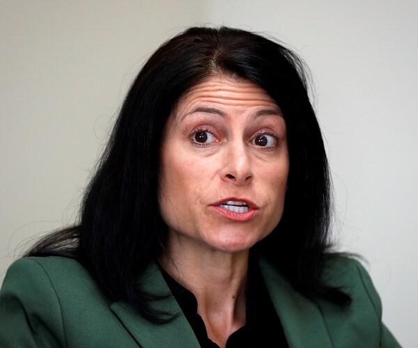 dana nessel speaks at meeting