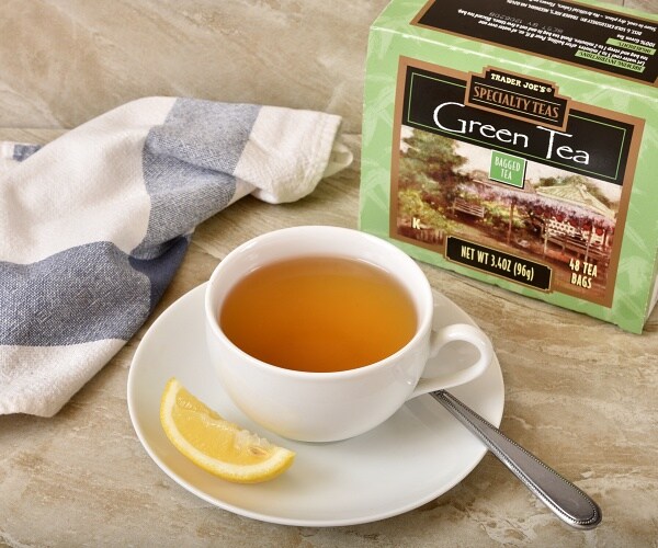 box and cup of green tea