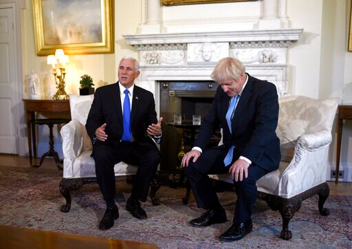 Pence Tiptoes past Brexit Tumult for an Oh-so-chipper Chat