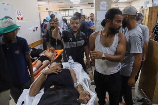 22 Palestinians Killed in Gaza as Israeli Forces Fire on Crowds at Food Aid Sites, Medics Say