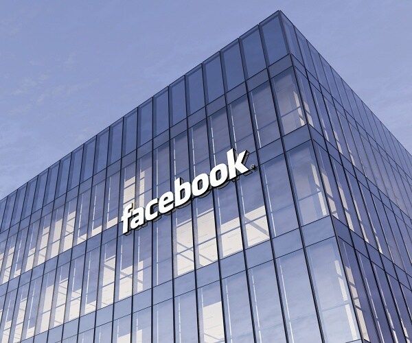 facebook sign on glass office building