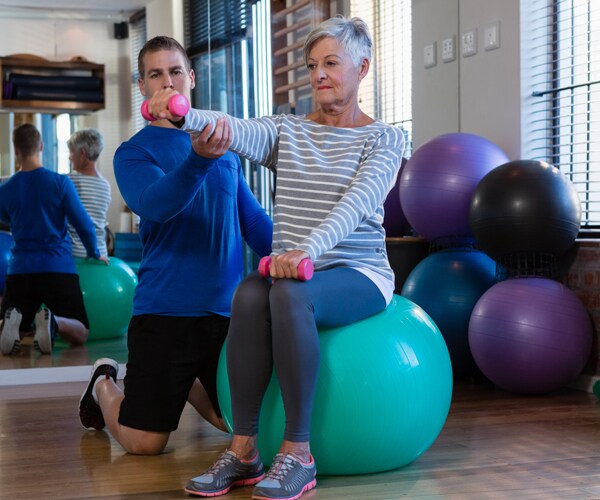 A senior citizen exercising