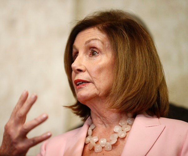 nancy pelosi speaks with her hands