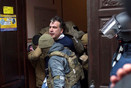 The Latest: Saakashvili, Backers March in Ukraine's Capital