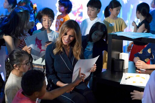Melania Trump Colors Fish with Kids at Japan Digital Museum