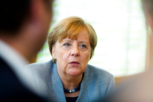 Germany: Merkel's Party Strikes Cautious Note on Euro Reform