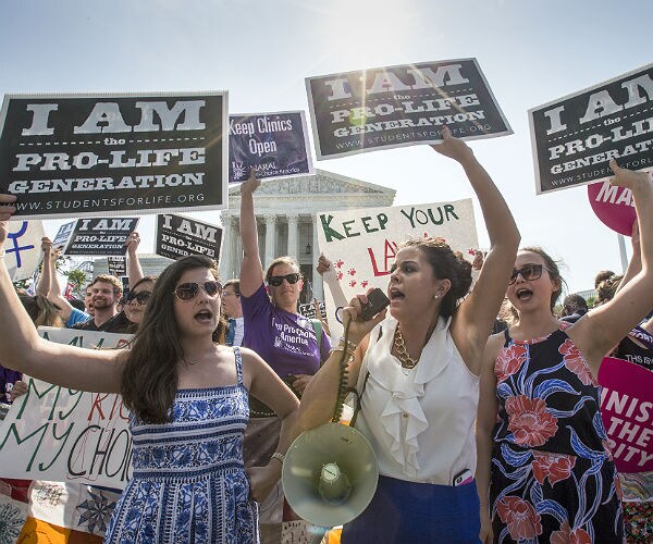 Clinton Policy Could Make Taxpayers Cover Half of All Abortions