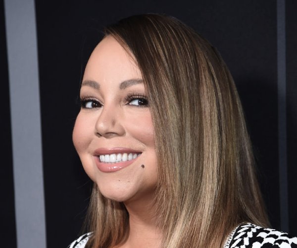 mariah carey attends a premiere