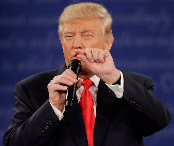 president donald trump points and speaks angrily during a presidential debate
