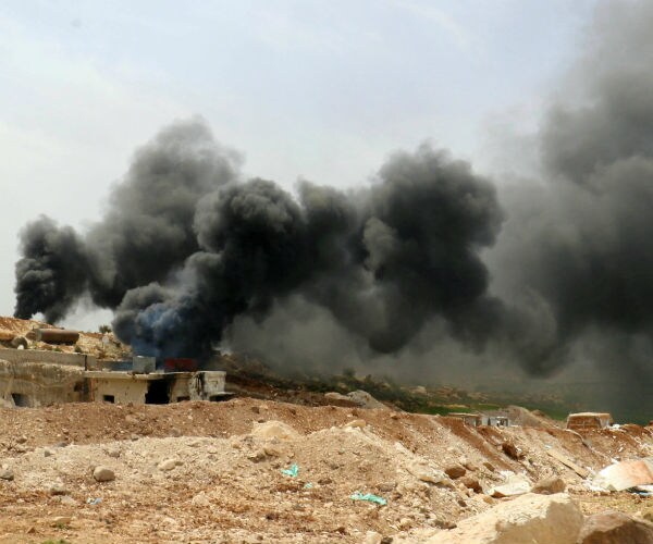 US-led Coalition Airstrikes in Eastern Syrian Town Kill 35