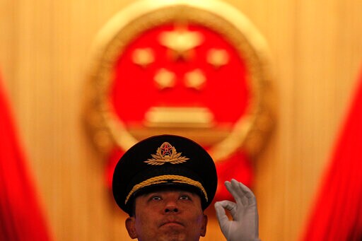 The Latest: China Promises All Companies Treated as Equals